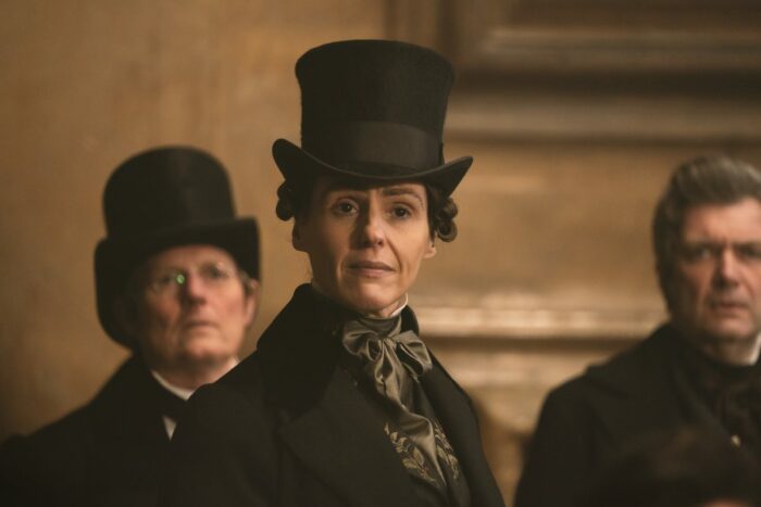 Anne Lister (Suranne Jones) the only woman in a meeting room of men.