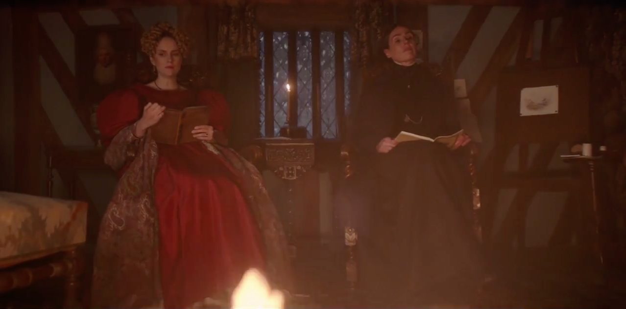 Walker and Lister (Sophia Rundle and Suranne Jones) awkwardly sit near a fire.