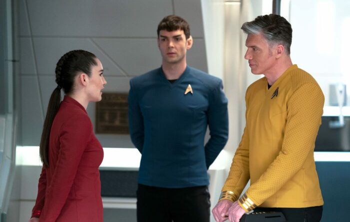 La'an, Spock and Pike stand in a corridor