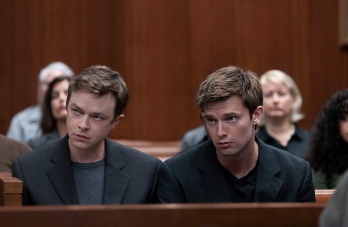 Todd and Clay sit in the courtroom
