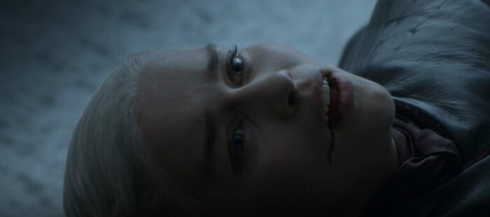Daenerys lies face up with blood dripping from her mouth