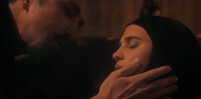 as Moreno, Gottfried (Lars Eidinger) caresses an unconscious Irma Vep, played by Mira (Alicia Vikander)