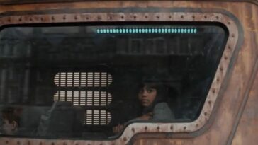 A young Indira looks out of a transport window in Moonhaven S1E3