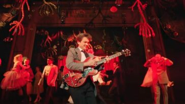 Marty McFly playing the guitar in the Back to the Future: The Musical trailer
