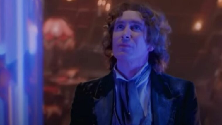The Eighth Doctor looks upwards, bathed in blue light, in the Doctor Who TV Movie