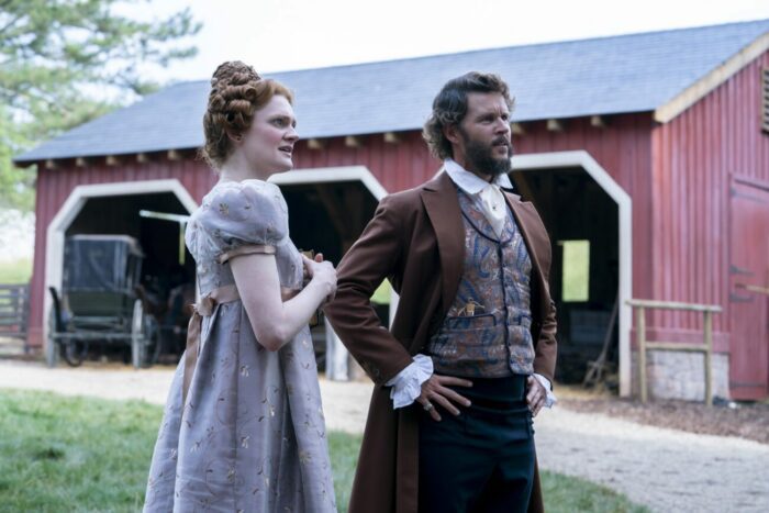 Gayle Rankin as Margaret Weylin, Ryan Kwanten as Thomas Weylin outside their house by the carrage stable