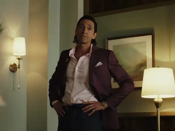 Sterling Frost Jr. (Adrien Brody) with his hands on his hips