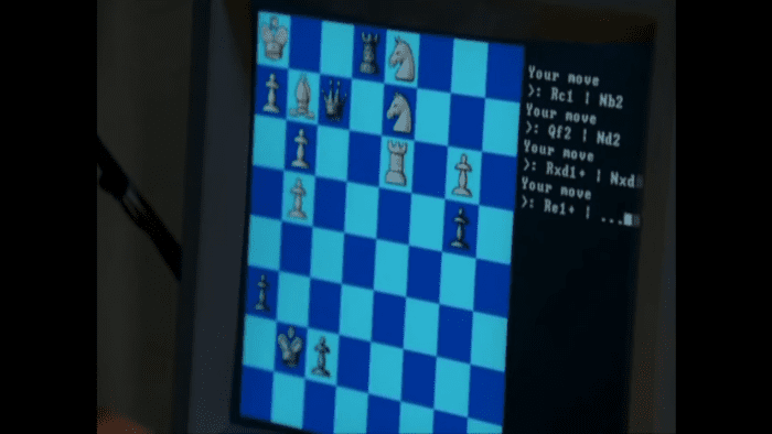 Closeup of an old computer screen showing a chess program