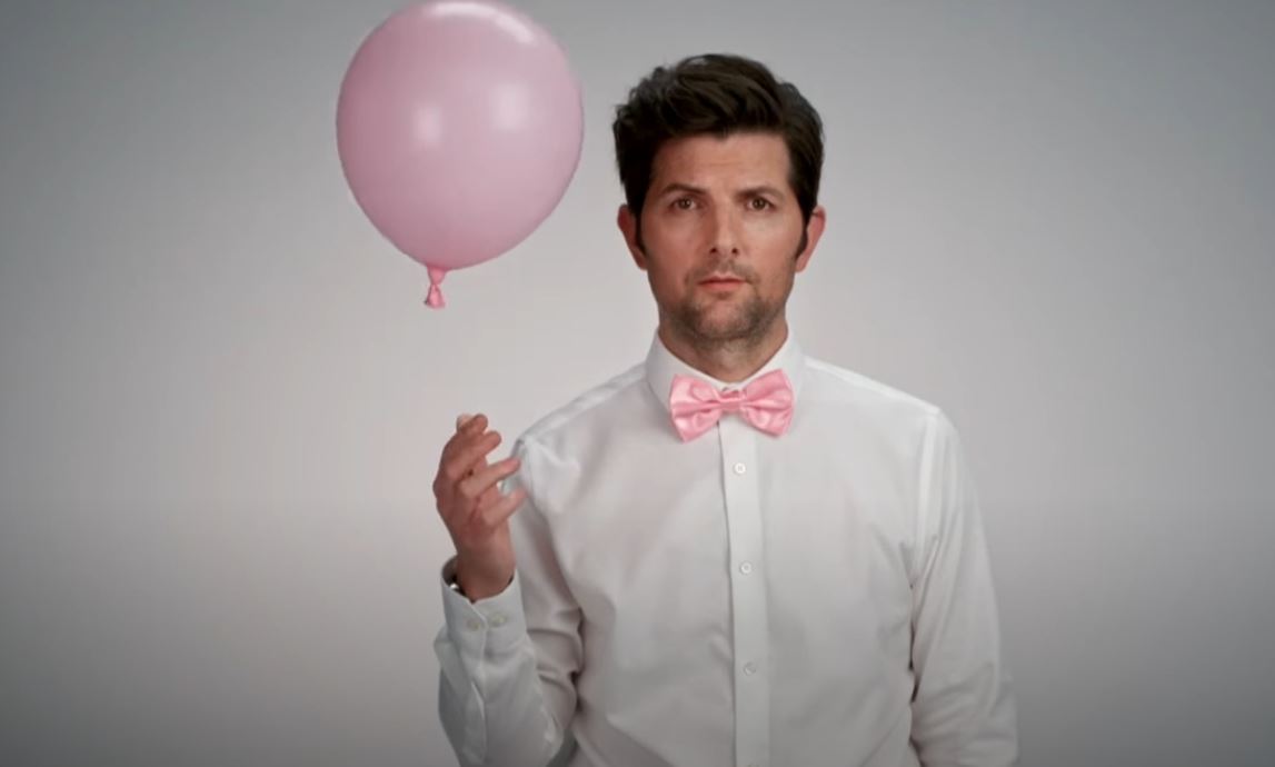 Adam Scott with a balloon in the teaser for Party Down Season 3
