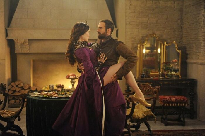 Galavant and Madalena dancing in the dining room