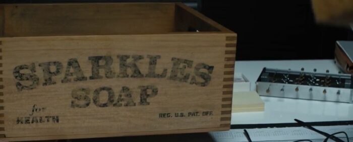 A wooden box that reads Sparkles Soap with Reg. U.S. Pat. Off. in the lower righthand corner