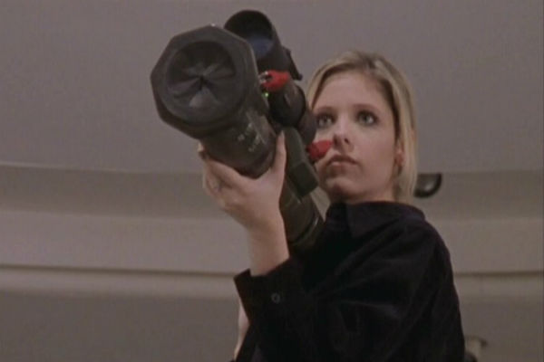 Buffy aiming a rocket launcher at her enemies in 'Innocence'