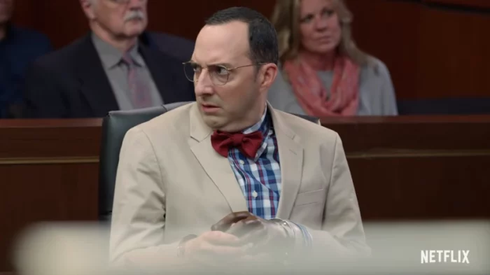 Buster Bluth (Tony Hale) in a suit and bowtie in court.