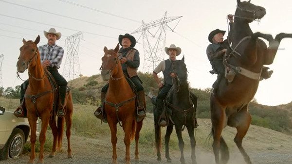 A still of season 5's "Mexican Romneys" rearing up on horseback.