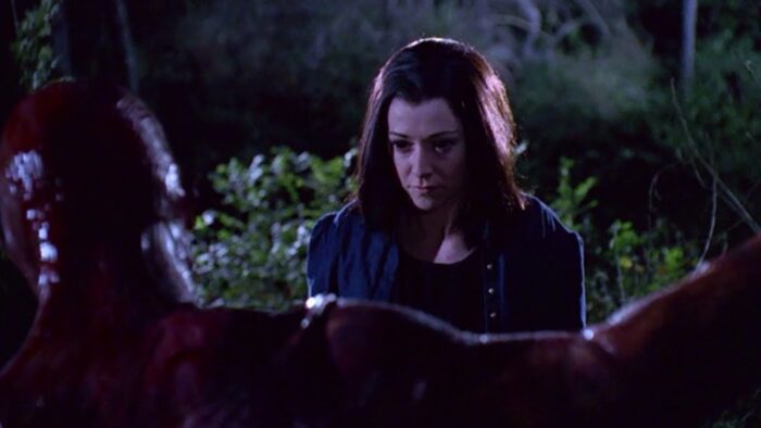 Dark Willow stares daggers at a flayed Warren in 'Villains'