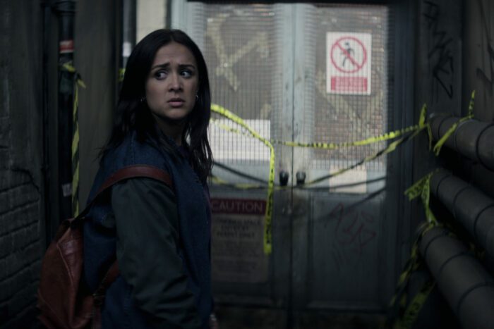 Amy-Leigh Hickman as Nadia Farran outside the abandoned building Joe used to hide Marienne