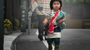 A three-year-old Japanese girl on the street, doing errands by herself on Old Enough!