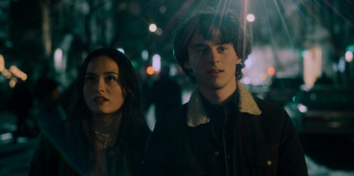 (Wyatt Oleff) as Charlie and (Chase Sui Wonders) as Samantha at night in New York City. Still from episode 2 of City on Fire