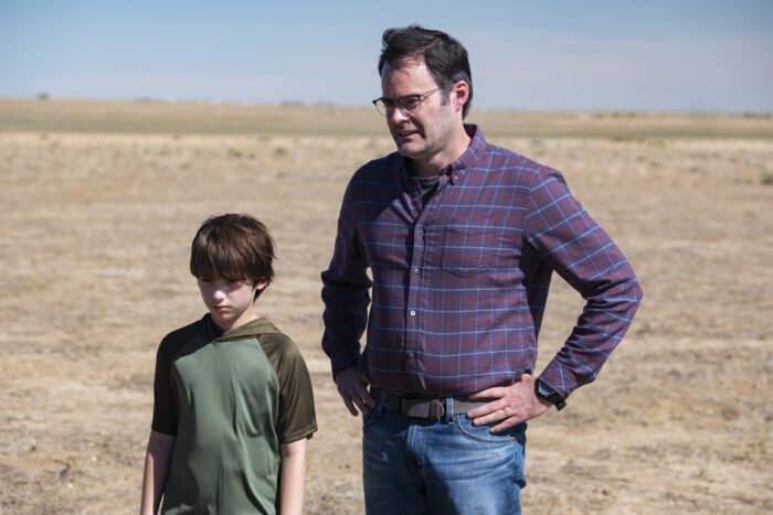 Barry as Clark with his son John in a desolate field