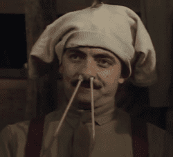 Blackadder, pants on head, pencils up nose, saying 'wubble' to no avail.