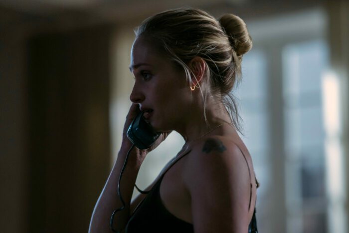 Jemima Kirke as Regan on the phone in City on Fire finale