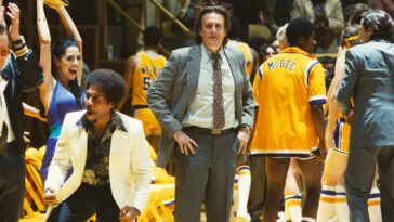 Pat Riley confronts Paul Westhead on the court.