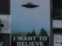 A poster with a flying saucer on it and the words "I Want to Believe"
