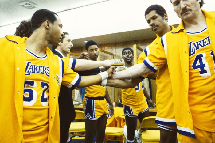 The Lakers bring in their hands to rally together in the locker room.