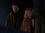 Mulder and Scully wearing jackets, splattered with manure, in "War of the Corprophages"