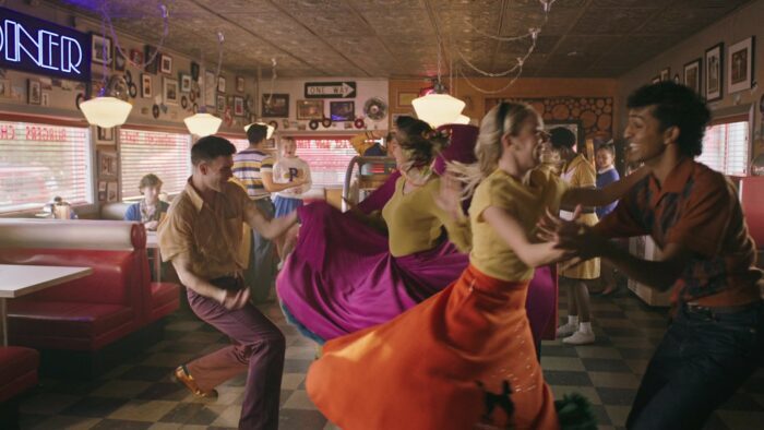 Young people dance in a diner in Riverdale