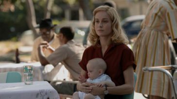 Brie Larson holds a baby in Lessons in Chemistry