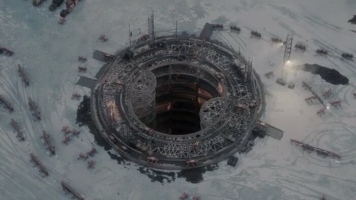 Arial shot of the underground silo being built by the swarm robots
