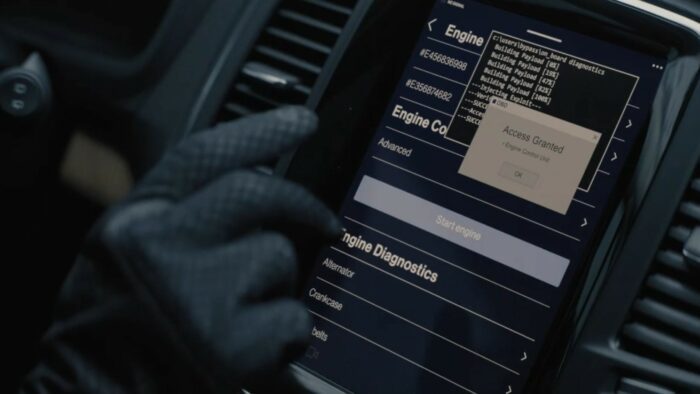 A Murder at the End of the World S1E4 - A gloved hand hovers over a car touchscreen with a diagnostic options menu displayed