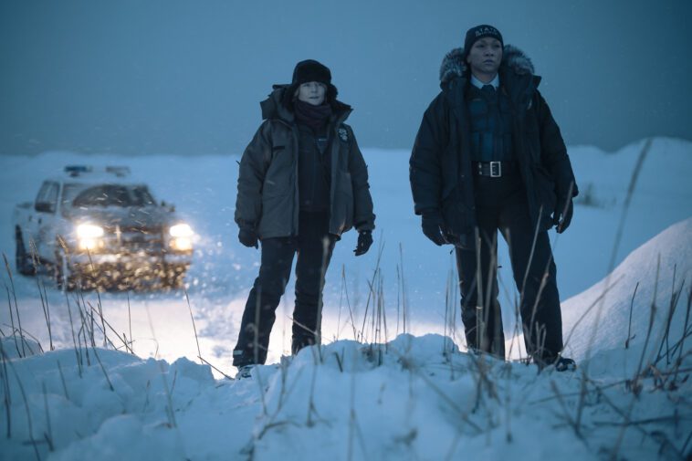Danvers and Navarro search through the ice for missing researchers