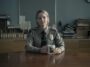 Danvers sits at a desk in uniform in the finale of True Detective: Night Country (Part 6)