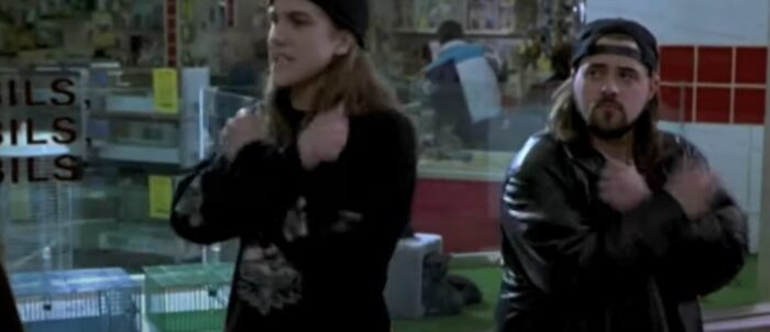 Jay and Silent Bob make Xs with their arms in Mallrats