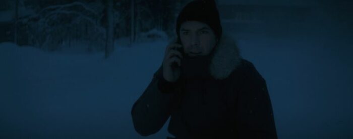 Magnus in the snow on the phone