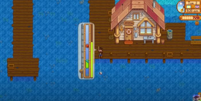 A figure next to a boat by the water in Stardew Valley