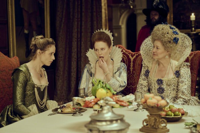 Left to Right: Niamh Algar (“Sandie”), Julianne Moore (“Mary Villiers”), and Trine Dyrholm (“Queen Anne”)