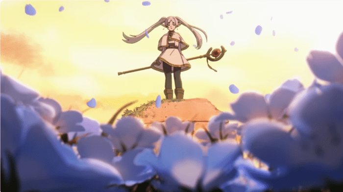 Frieren, an elf woman with long grey hair wearing a short white rob, stands atop a large rock. She is holding a long staff. Indigo flowers frame the foreground, and the sky is a luminous yellow. There are indigo flower petals in the air.